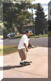 Bill skateboarding.